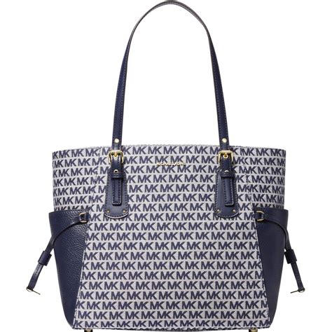 michael kors logo voyager east west tote|Michael Kors voyager tote merlot.